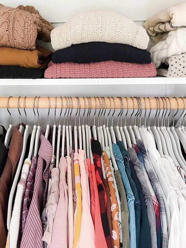 Color-coded closet by Simplify Studio NC