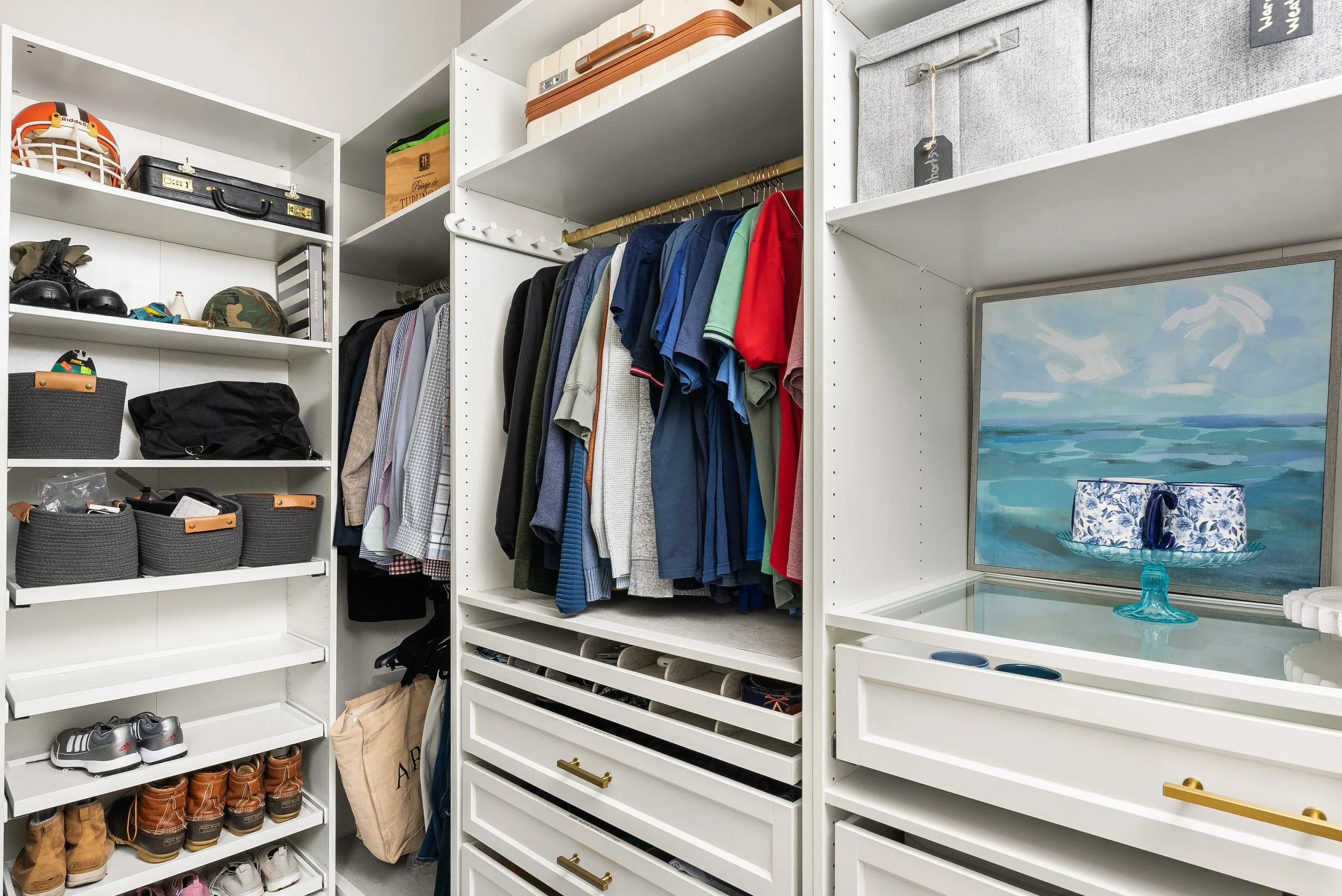 Organized closet with neatly arranged clothing and storage baskets; illustrative Sort It Out project image, not identified as an Arlington location